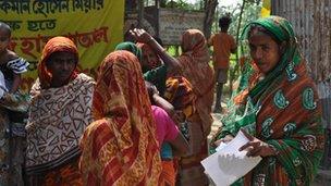 Village women waiting outside the clinic