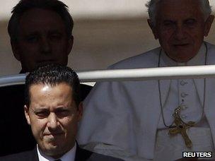 The Pope's butler, Paolo Gabriele (bottom left) arrives with Pope Benedict at the Vatican (23 May 2012).