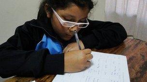 Xiomara doing her homework