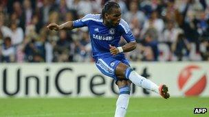 Didier Drogba shoots at the UEFA Champions League final football match between FC Bayern Muenchen and Chelsea FC on 19 May 2012