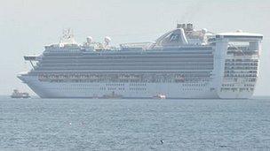 Travel Trident and tender alongside cruise ship the Caribbean Princess