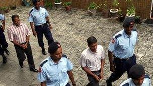 Sandip Mooneea, (left) and Avinash Treebhoowoon, at the Supreme Court in Port Louis