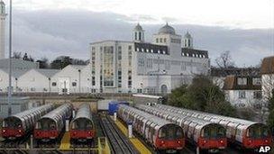 Tube trains sit at a depot in Morden, south London