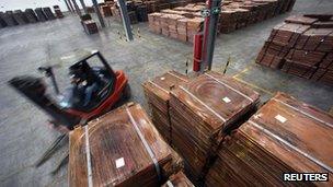 Copper cathodes stacked in a warehouse near Shanghai