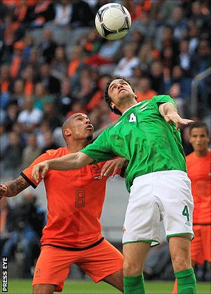 Nigel de Jong of the Netherlands in action against Northern Ireland's Michael Duff