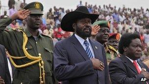 President Salva Kiir, centre, arrives at the John Garang Mausoleum in Juba, Sudan April 27, 2012