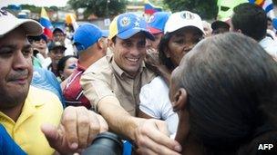 Henrique Capriles (centre) on the campaign trail on 1 June