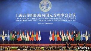 Chinese President Hu Jintao chairs the closing session of the Shanghai Cooperation Organization (SCO) summit in the Great Hall of the People in Beijing on 7 June, 2012