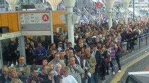 People waiting for buses at Stratford