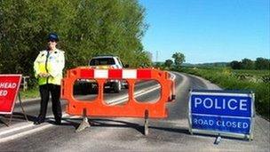 Road closed sign in Alderton