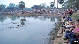 Tourists waiting for sunrise at Angkor Wat on 23 February, 2011