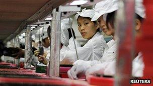 File photo: Workers at a Foxconn factory in China