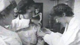 Woman having vaccination