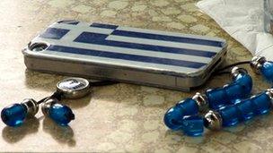 iPhone in a Greek flag case