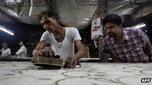 Workers at a factory in India