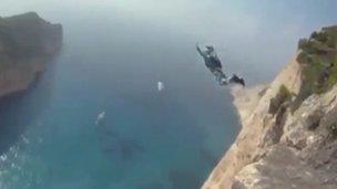 Another base jumper leaps from the same cliff as Mr Simkins