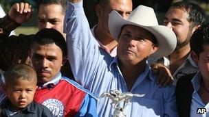 Jose Trevino Morales with horseracing trophy - photo September 2010