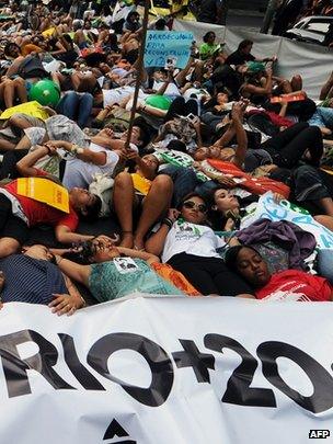 Activists lie on Rio Branco in Rio de Janeiro