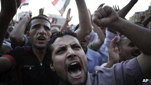 Men chant anti-Supreme Council for the Armed Forces (Scaf) slogans in Tahrir Square in Cairo - 21 June, 2012