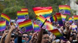 People mark the International Day against Homophobia in Santiago on 12 May 2012