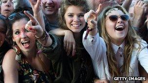 Festival-goers enjoy the main stage on day two of The Isle of Wight Festival