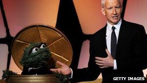 Anderson Cooper and Oscar the Grouch