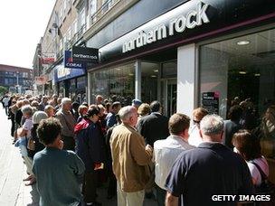 Customers of Northern Rock queue outside the Kingston branch in order to take their money out of their accounts on 15 September 2007