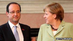 French President Francois Hollande (left) and German Chancellor Angela Merkel, 22 Jun 12