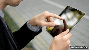 Man using tablet computer