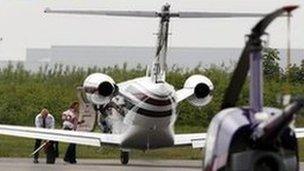 Coleen Rooney and son Kai at Liverpool Airport, travelling by private jet