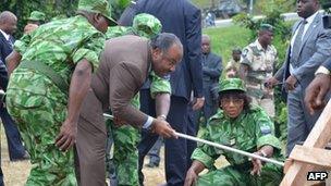 Gabonese President Ali Bongo (C) gets ready to set fire to the seized ivory