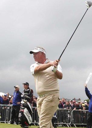 Darren Clarke tees off on the first hole on Thursday