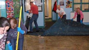 Staff and parents help with RGS clean-up