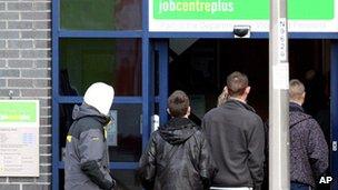 People queuing outside a job centre