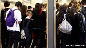 Teenagers in school corridor