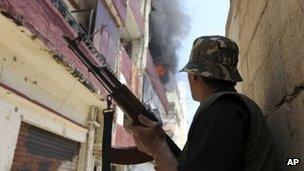 A Sunni gunman fights in Tripoli, Lebanon. Photo: June 2012