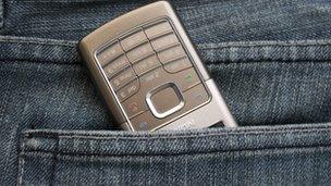 Mobile phone in pocket