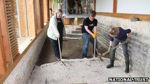 Archaeologists at work on the mosaic