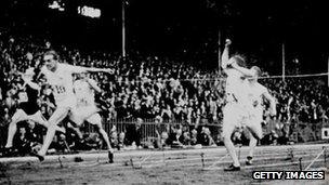 Harold Abrahams crosses the line to win the 100m at the 1924 Olympic Games in Paris.