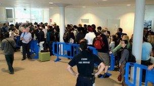 Physicists queued for an overflow room to hear the Higgs results