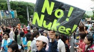 Anti nuclear activists hold a rally to protest against resume of nuclear power plant at Oi town in Fukui on 1 July, 2012