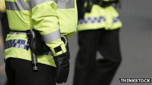 Two police officers in high visibility jackets