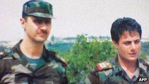 Syrian President Bashar al-Assad (left) and Manaf Tlas. File photo