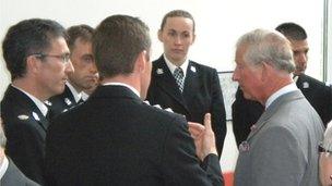 Prince Charles speaking to police