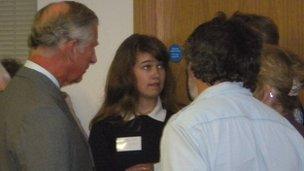 Prince Charles speaking to flood victims