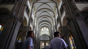 Two men in the church in Shanghai where Bishop Ma is reported to be held