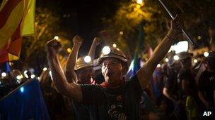 Miners march along street in Madrid (10 July)