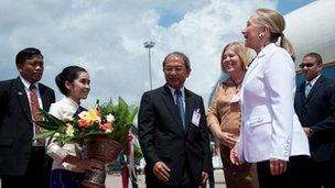 US Secretary of State Hillary Clinton is greeted upon her arrival at Wattay International Airport in Vientiane on 11 July, 2012