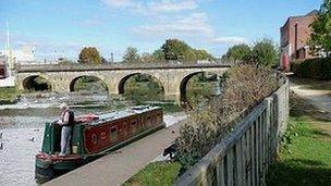 Impression of narrowboat moored on River Avon in Melksham