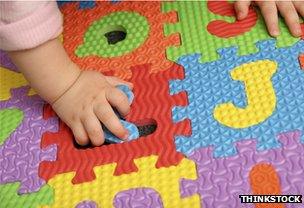 Child playing with puzzle